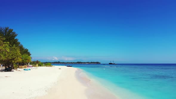 Aerial top view landscape of idyllic bay beach vacation by blue water with white sandy background of