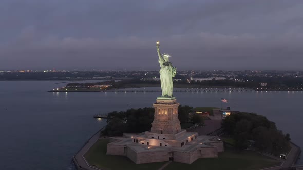 Circling Statue of Liberty Beautifully Illuminated in Early Morning Light New York City