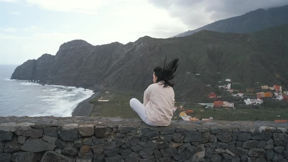 Woman Sits on the Observation Deck on the Canarian Island of La Gomera