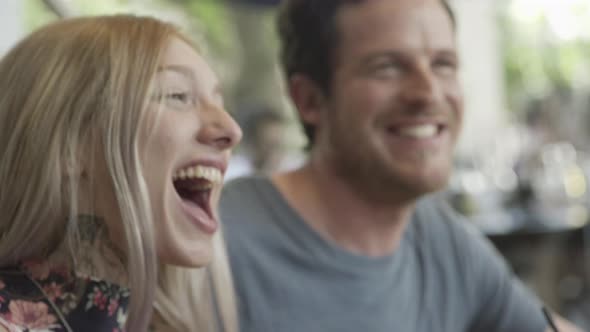 Woman laughing and making faces