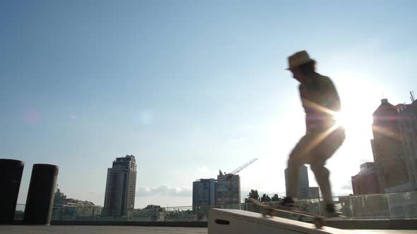 Young Skater Doing Ollie with Indy Grab