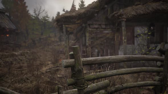 Old Farm House in Lithuania with a Fence alt