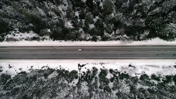 Winter Roadtrip Travel Over Snowy Mountain Pass alt