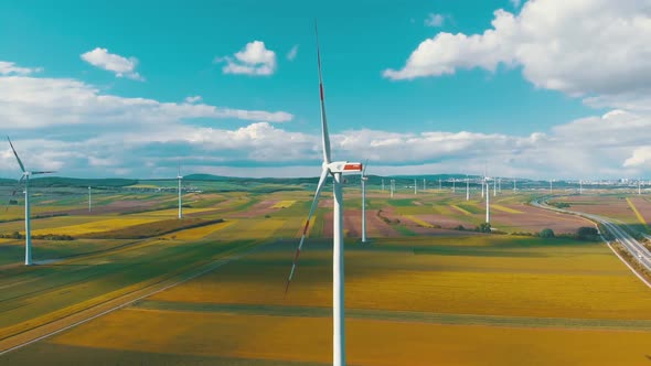 Aerial View of Wind Turbines Farm in Field. Austria. Drone View on Energy Production