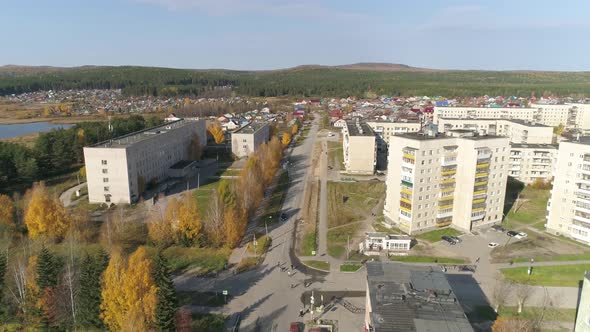 Aerial view of A provincial Russian city with low buildings. Autumn sunny day. 40