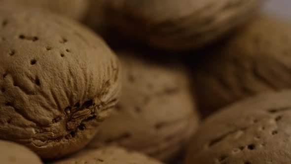 Cinematic, rotating shot of almonds on a white surface - ALMONDS 151