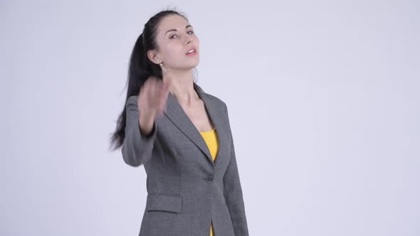 Angry Young Businesswoman Giving Thumbs Down