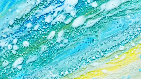 Colorful Liquid Paint and Oil Mix. Color Abstraction. Bubbles Paint in the Water. Slow Motion of