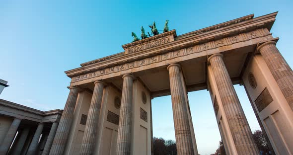 Hyper lapse of the Brandenburg Gate Berlin with blue sky and clouds