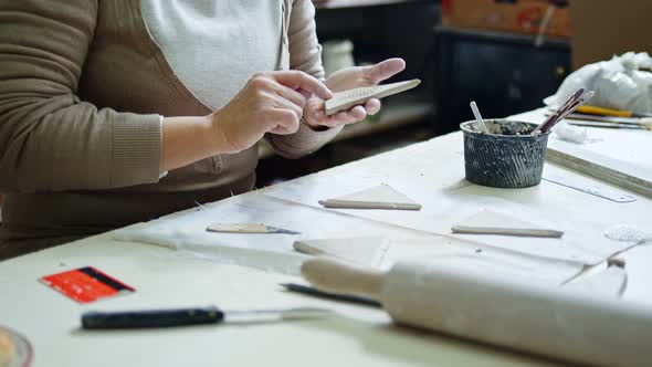 Working In A Ceramic Art Workshop 5