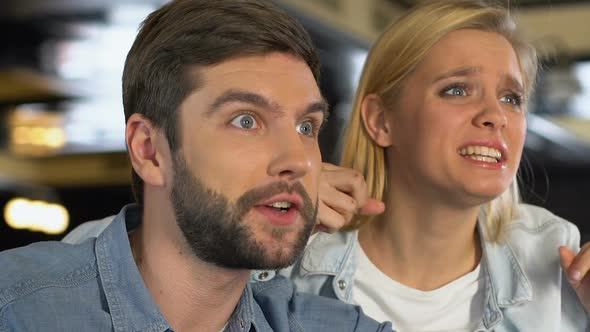 Caucasian Couple Extremely Happy About Favorite Sports Team Winning Game, League