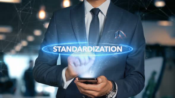 Businessman Smartphone Hologram Word   Standardization
