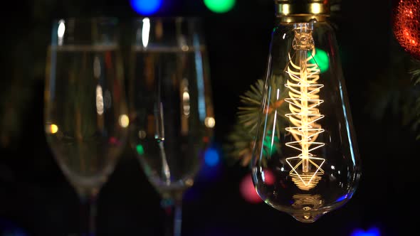 Two Glasses Champagne Light Bulbs Festive Atmosphere Multicolored Garland