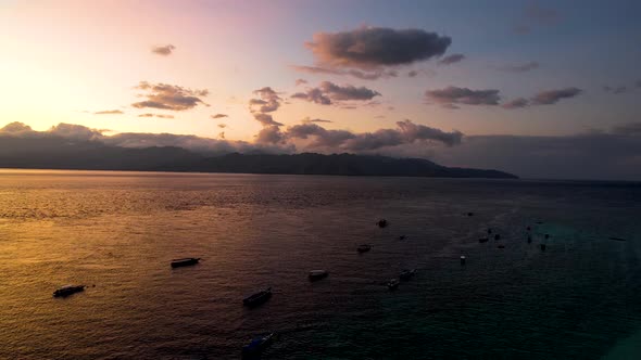 Aerial view of Gili Trawangan Island, Indonesia with morning sunrise sunlight.