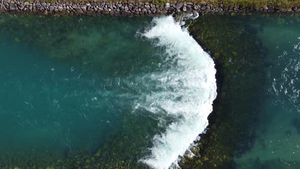 River Lo-elva coming from lovatnet lake in Loen- Ascending aerial close to far showing steady stream