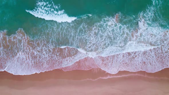 High quality footage Top view Sea beach beautiful waves Foaming and Splashing on the beach sand