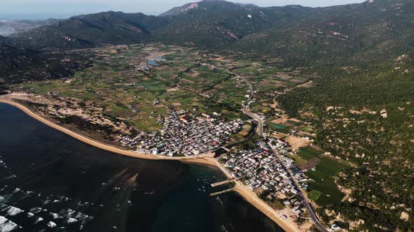 Aerial seascape of fisherman village Thai An Vietnam travel destination famous for vineyard juicy gr