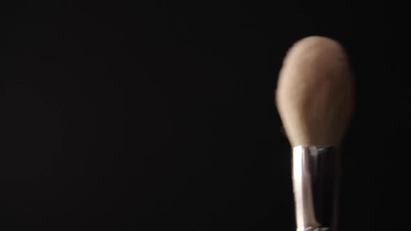 Closeup of a Makeup Brush with Face Powder