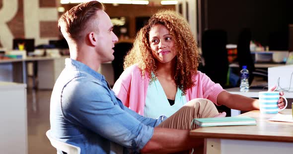 Businessman interacting with coworker