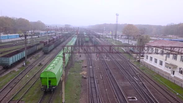 Aerial Overhead View of Freight Trains and Tracks at a Rail Yard