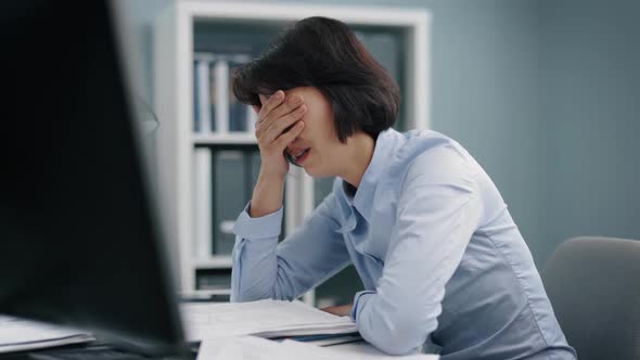 Office Worker Suffering From Burnout