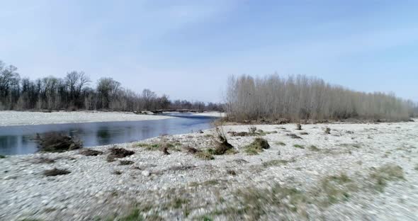 Moving Forward Over River Bed in Autumn or Winter