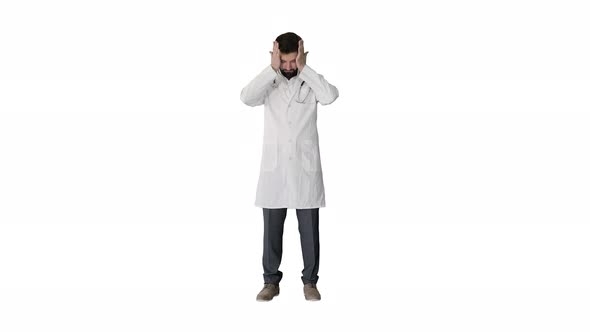 Вepressed Doctor Holding His Head on White Background