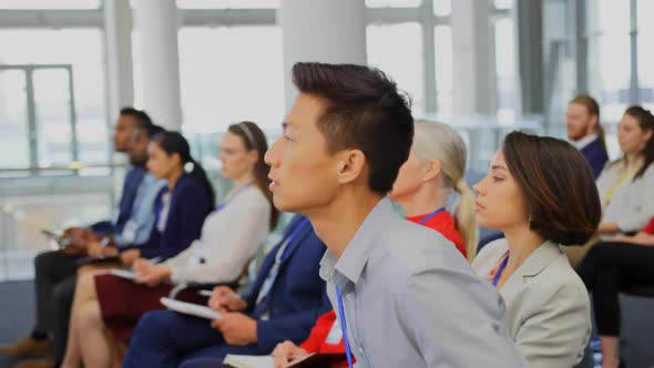 Businessman raising hand in the business seminar 4k