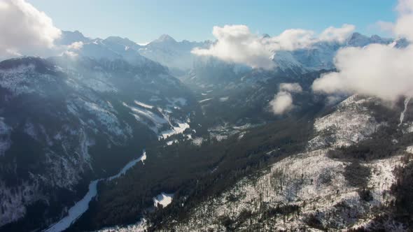 Scenic Aerial Background View of Mountains Range Landscape in Sunny Winter Day