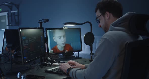 Programmer Talking with a Boy Via a VoIP Call