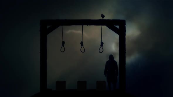 Executioner Standing In A Gallows Under A Storm