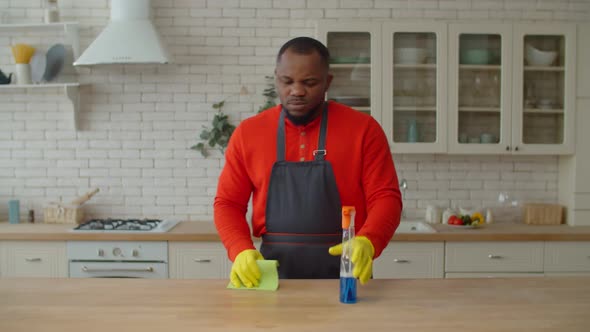 Irritated Black Man Tired of Boring Household Routines