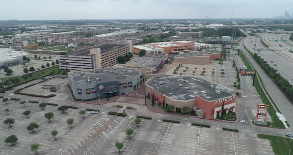 Aerial of empty parking lot of entertainment complex do to  coronavirus pandemic