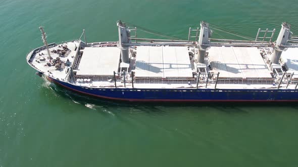 Aerial view of rdry cargo ship floats. Ship logistic and transportation business industry.