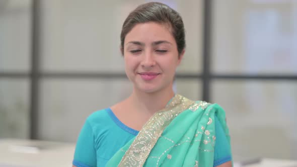 Portrait of Attractive Indian Woman Smiling at Camera