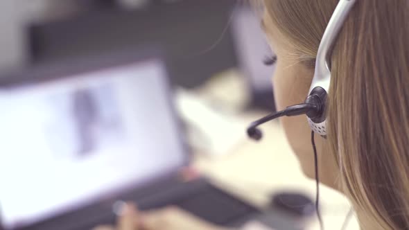 Call Center Agent Speaking with Customer