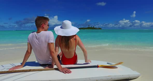 Happy boy and girl married on vacation spend quality time on beach on white sand  background