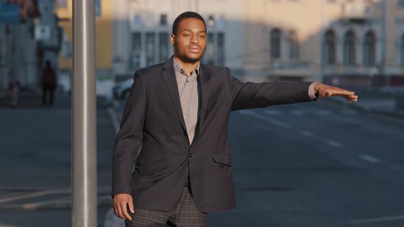 Nervous Excited African American Black Male Student Wearing Suit is Afraid of Being Late Trying to