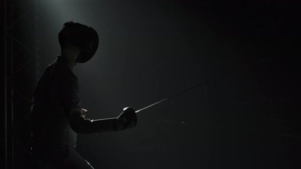 Two Professional Fencers Demonstrate Their Mastery of Foil Fencing