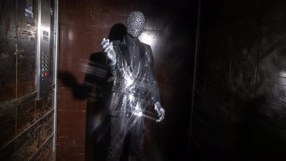 Sparkle Masked Man Dancing in a Lift