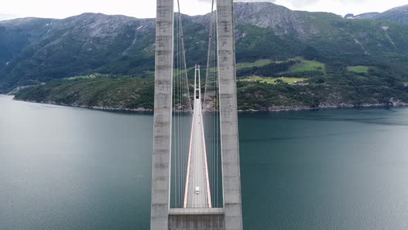 Spectacular Hardanger-bridge aerial - Moving ahead in between bridge wires and concrete columns - Pa
