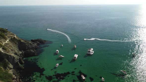 Aerial Panoramic View of Seascape with Crystal Clear Azure Sea and Rocky Shores