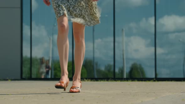 Female Legs Walking Forward And Stepping Over The Obstacle