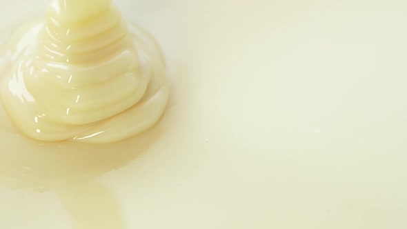 White Yogurt Sauce Milk Caramel Texture Close Up Abstract Beige Cream Motion