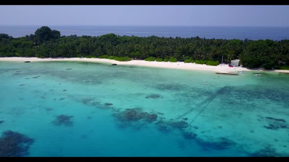 Aerial top down nature of beautiful sea view beach trip by transparent ocean with white sandy backgr