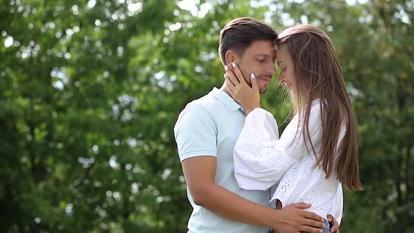 Couple In Love Kissing And Hugging In Nature