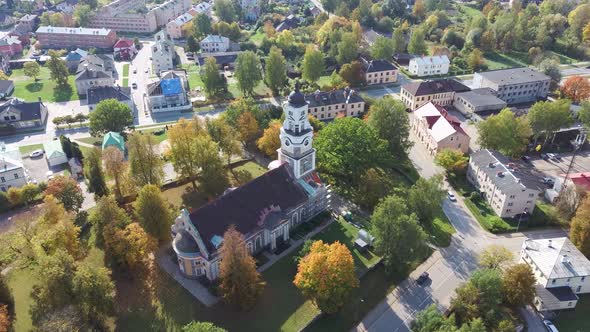 Latvia, Aluksne Old Lutheran Church With Golden Cock Statue on the Top of Tower, Aerial Dron 4K Shot