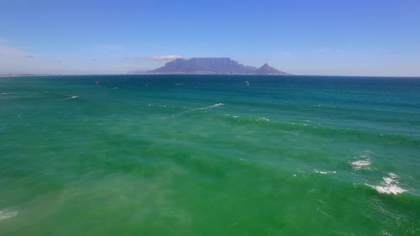 Aerial travel drone view of Table Mountain, Table Bay from Bloubergstrand, Cape Town, South Africa.