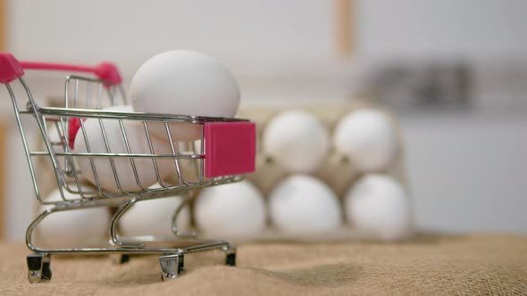 Fresh Store Bought Chicken Eggs In A Supermarket Trolley, Natural White Chicken Eggs