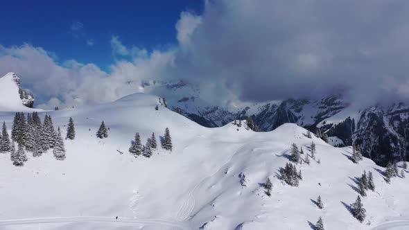 Beautiful Sunny Winter´s Day in the Alps with Snow Capped Mountains  Aerial Drone Footage